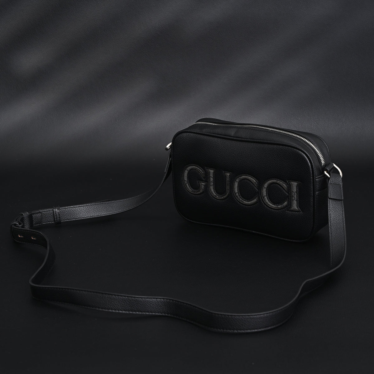 Gucci Black Leather Embossed Logo Belt Bag